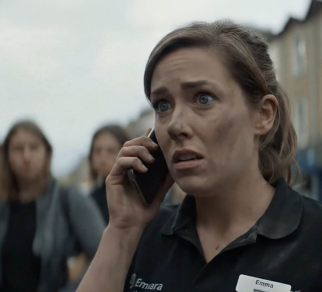 a retail worker has been in an emergency situation - she is on the phone to the emergency services